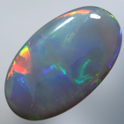SOLID SEMI BLACK OPAL Neon orange to neon gold contrasted by violet